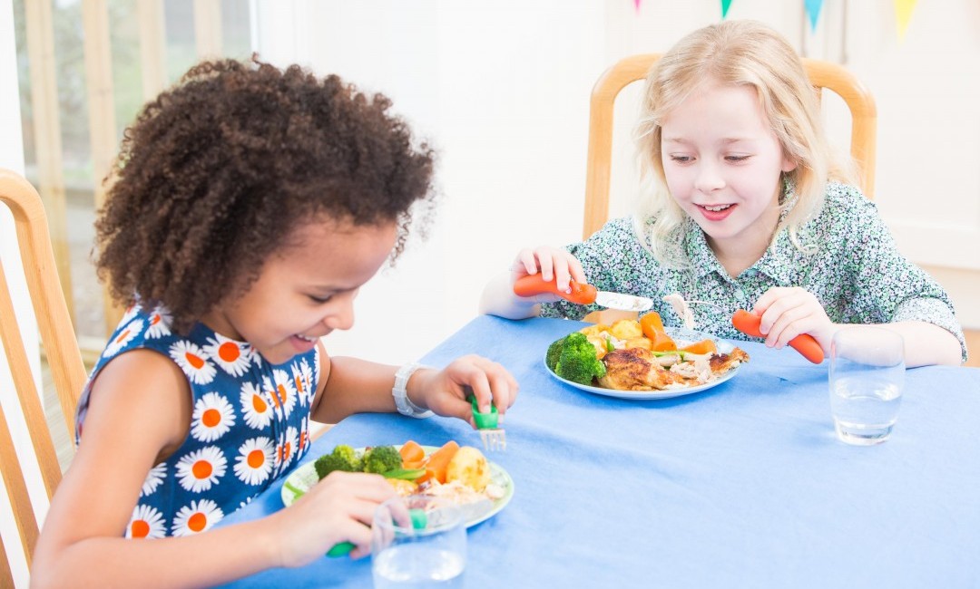 Children eating with Nana's Manners Cutlery